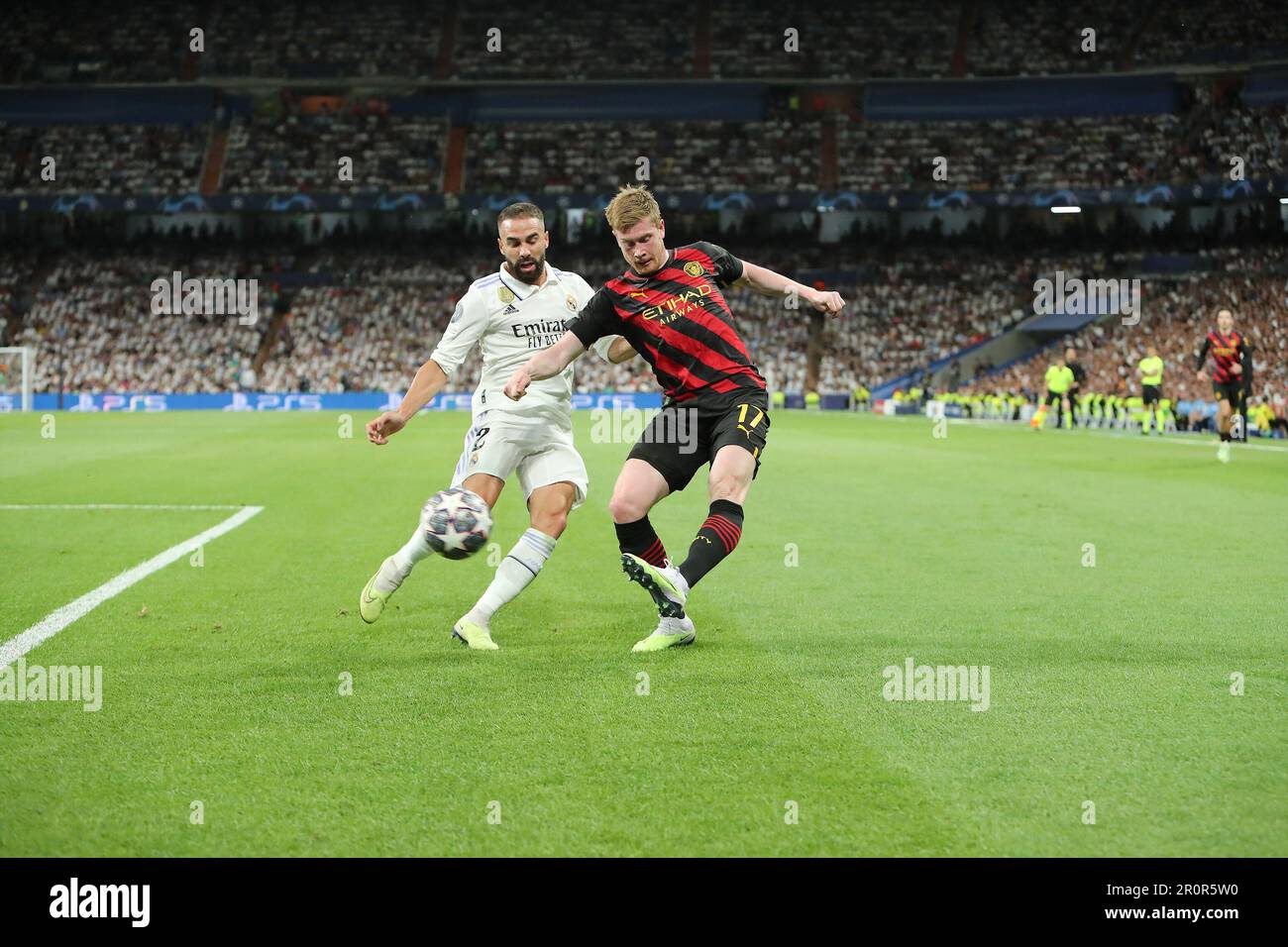 Madrid, Spain. 09th May, 2023. Manchester City´s De Bruyne (R) and Real Madrid´s Carvajal (L) in action during Champions League Semifinal Leg 1 between Real Madrid and Manchester City at Santiago Bernabeu Stadium in Madrid, Spain, on May 9, 2023. Credit: Edward F. Peters/Alamy Live News Stock Photo