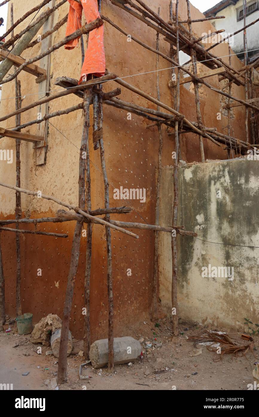 Construction, scaffolding, dilapidated, dangerous, old town, Zanzibar, Tanzania Stock Photo