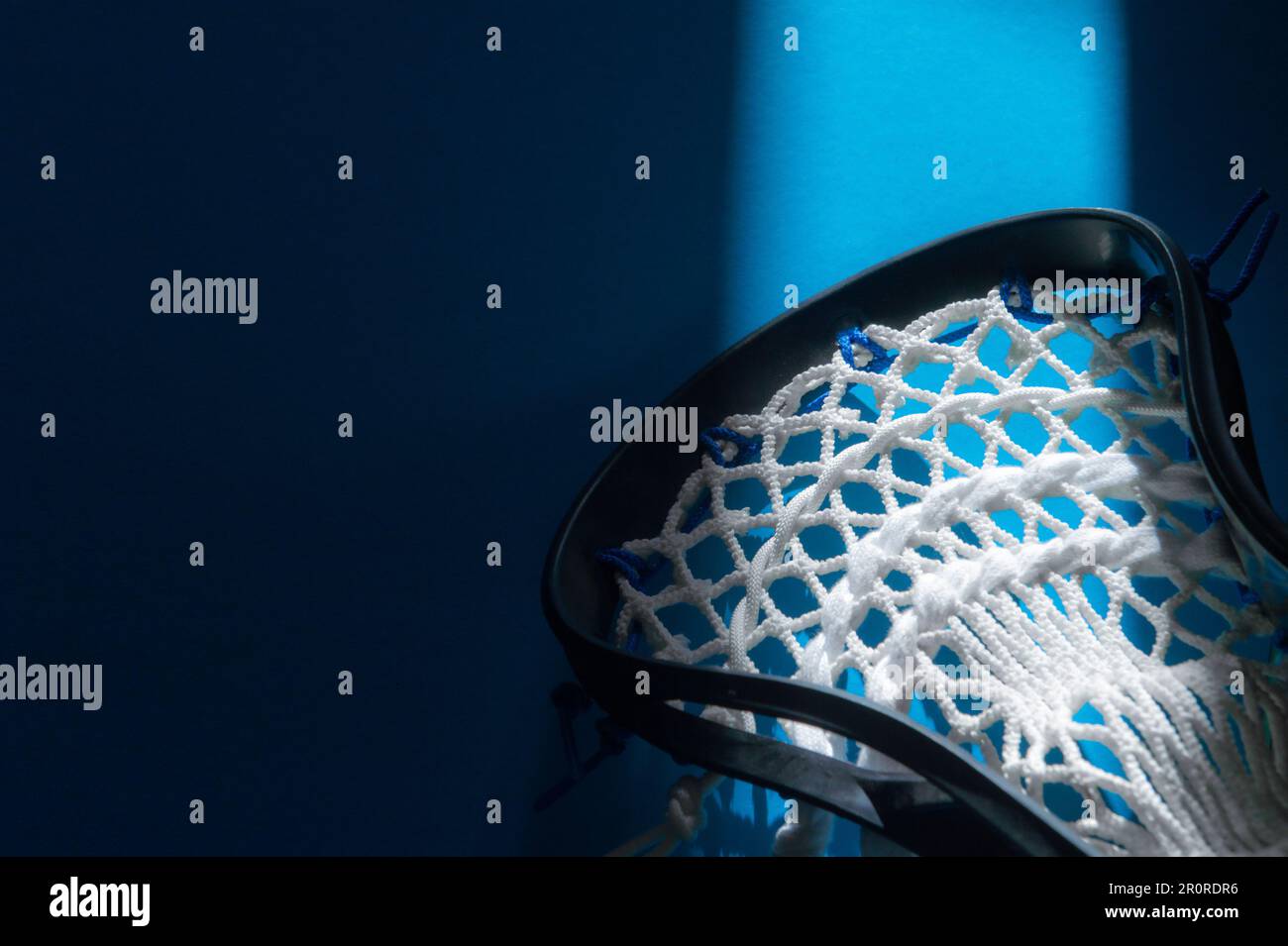 Lacrosse stick on blue background. Horizontal sport theme poster, greeting cards, headers, website and app Stock Photo