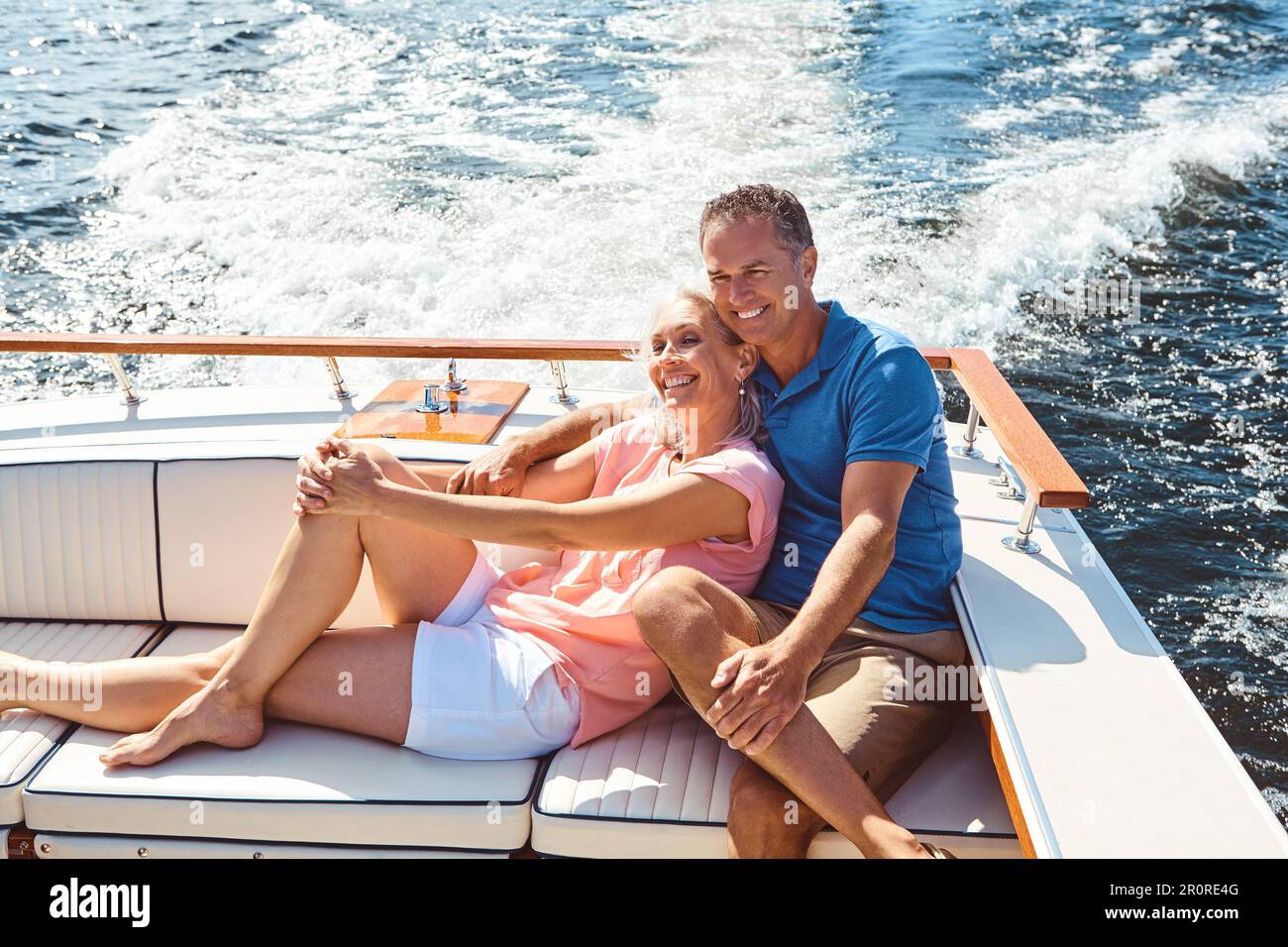 Treating themselves to a romantic boat ride. a mature couple enjoying a ...