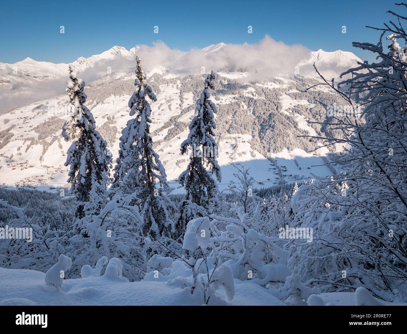 A majestic winter scene in the French Alps, featuring a pristine ...