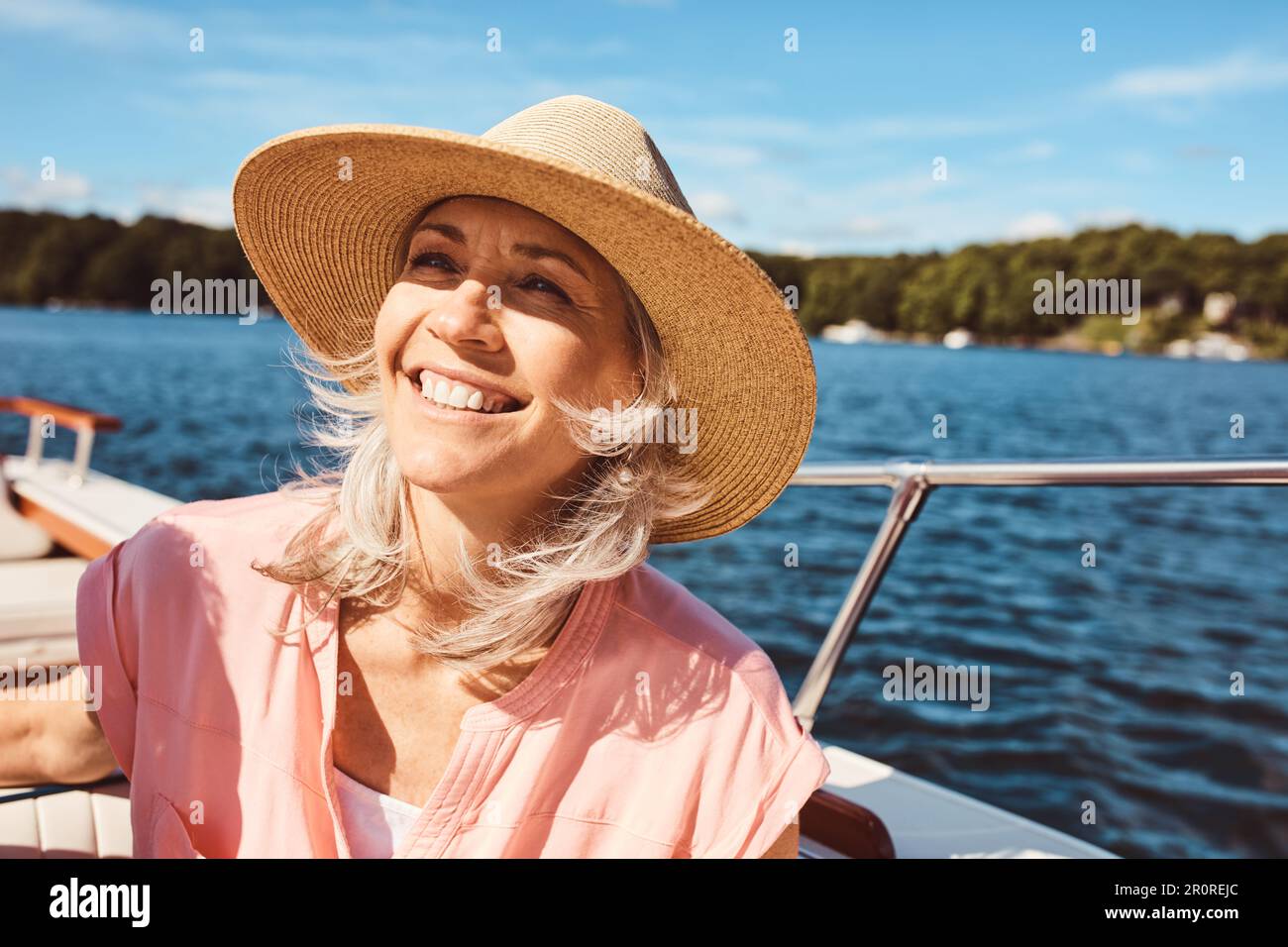 Free Photo  Young woman enjoying the ocean breeze