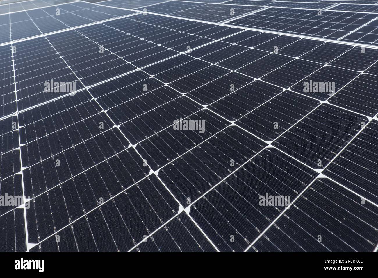 surface of modern solar panels installed on the roof of a building Stock Photo