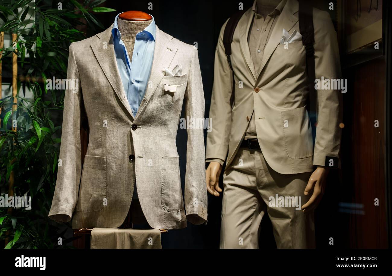 Men's summer clothes in a shop window Stock Photo Alamy