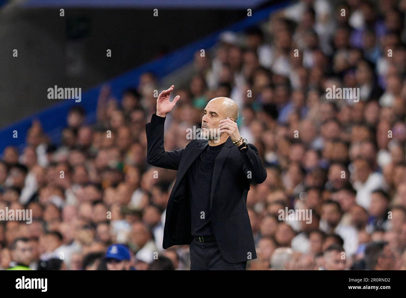 Madrid, Spain. 09th May, 2023. Manchester City FC head coach Josep Guardiola reacts during the UEFA Champions League semifinal first leg football match between Real Madrid CF and Manchester City at the Santiago Bernabeu Stadium in Madrid. The final score of the game is Real Madrid 1 - 1 Manchester City Credit: SOPA Images Limited/Alamy Live News Stock Photo
