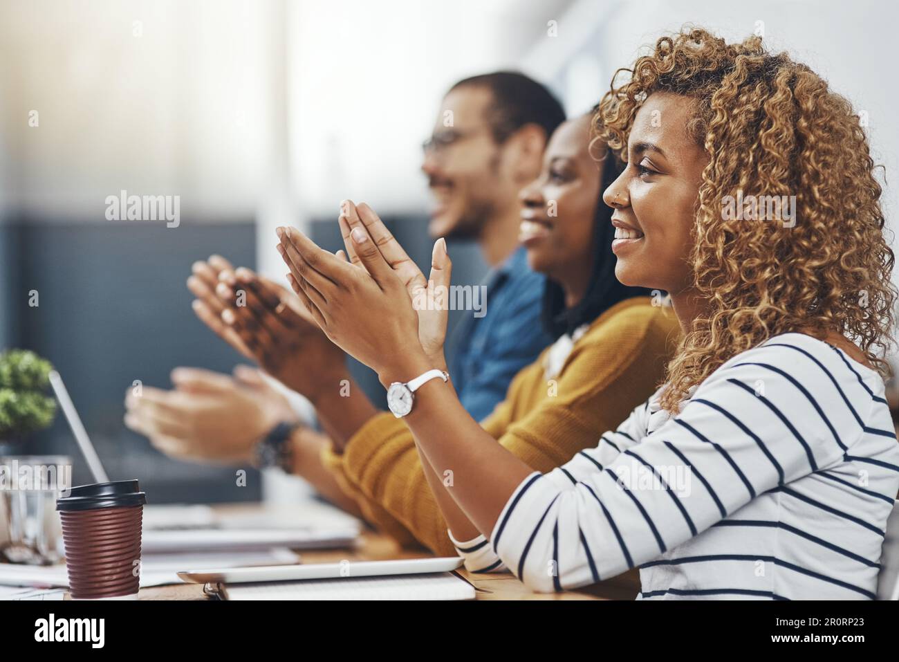 Well done Great job. a group of business people clapping hands Stock
