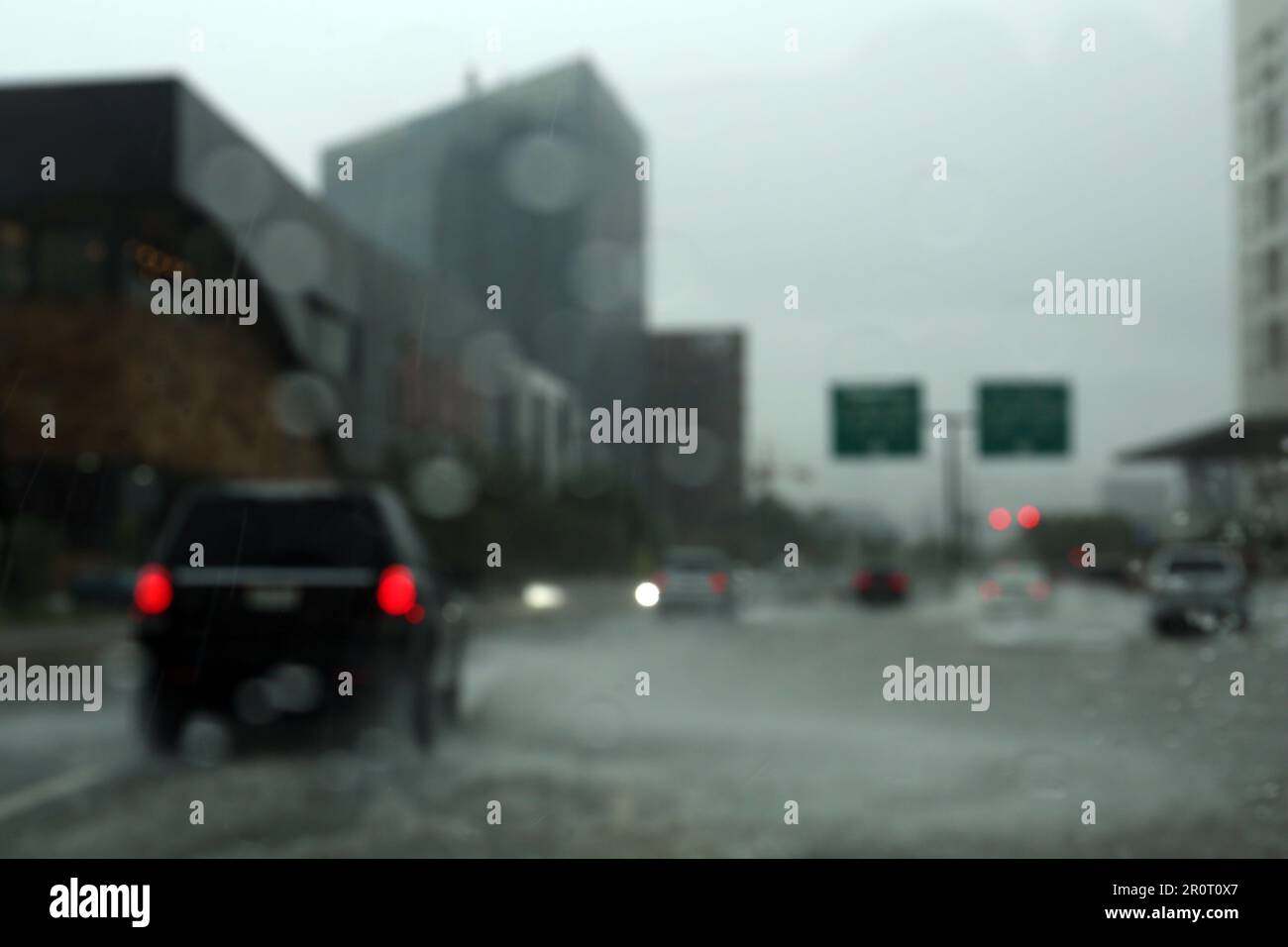 Road on rainy day, view through car window with water drops Stock Photo ...