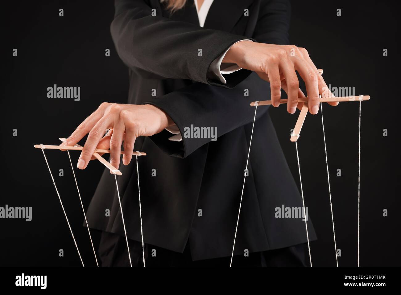 Woman in suit pulling hi-res stock photography and images - Alamy