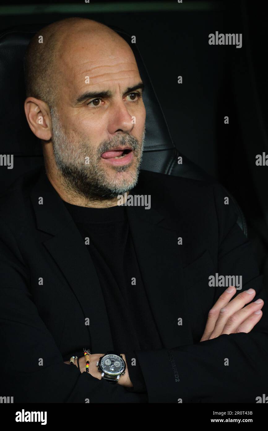 Madrid, Spain. 9th May, 2023. Josep Guardiola of Manchester City reacts before the UEFA Champions League semifinal first Leg match between Real Madrid and Manchester City in Madrid, Spain, on May 9, 2023. Credit: Meng Dingbo/Xinhua/Alamy Live News Stock Photo