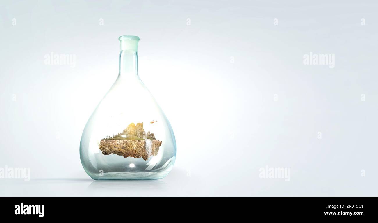 Landscape with mountain floating inside bottle Stock Photo - Alamy