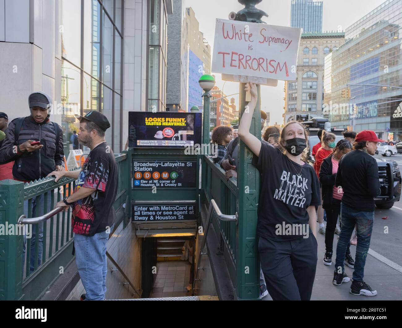 NEW YORK, N.Y. – May 8, 2023: People are seen outside the Broadway-Lafayette Street subway station prior to a vigil for Jordan Neely. Stock Photo