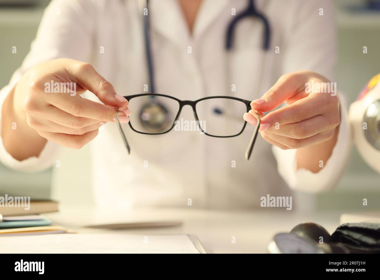 Doctor giving medical certificate hi-res stock photography and images ...