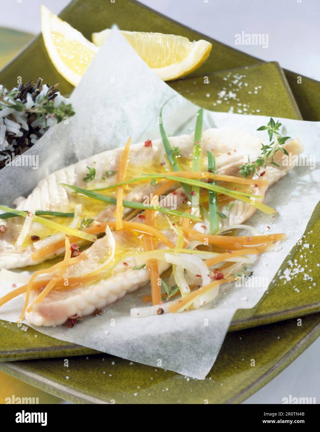 Sole and vegetables cooked in wax paper Stock Photo Alamy