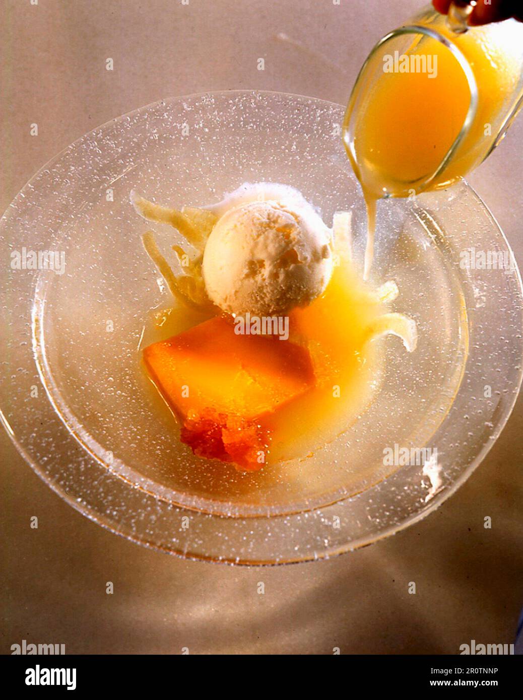 Melon soup with ginger and lemon sorbet Stock Photo