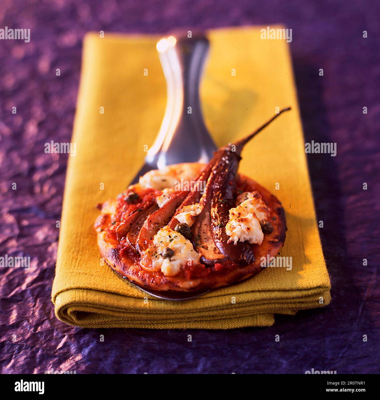 Mini pizzas with roasted eggplant Stock Photo - Alamy