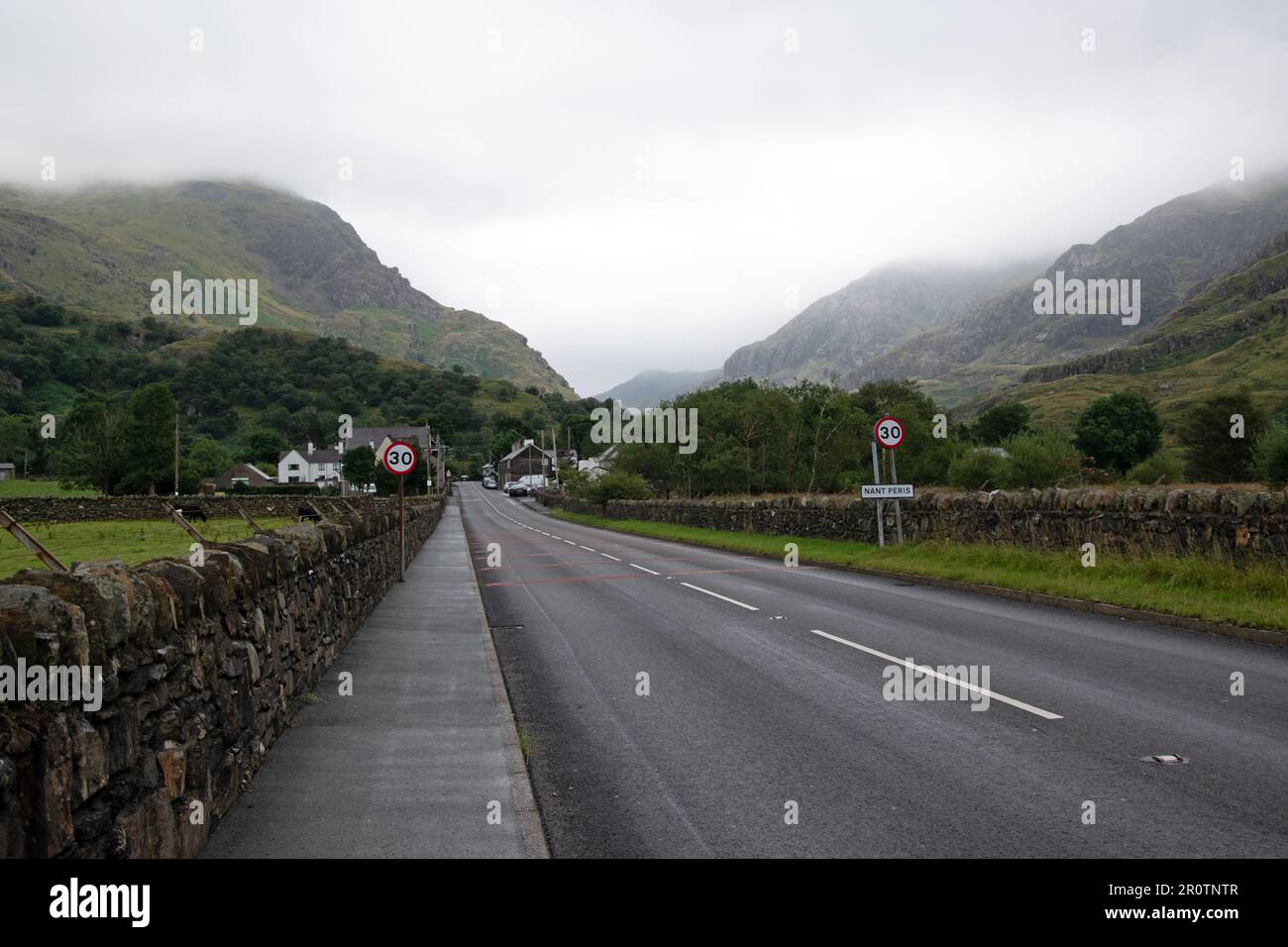 Nant Peris, Snowdonia valley and mountain, tar road Stock Photo