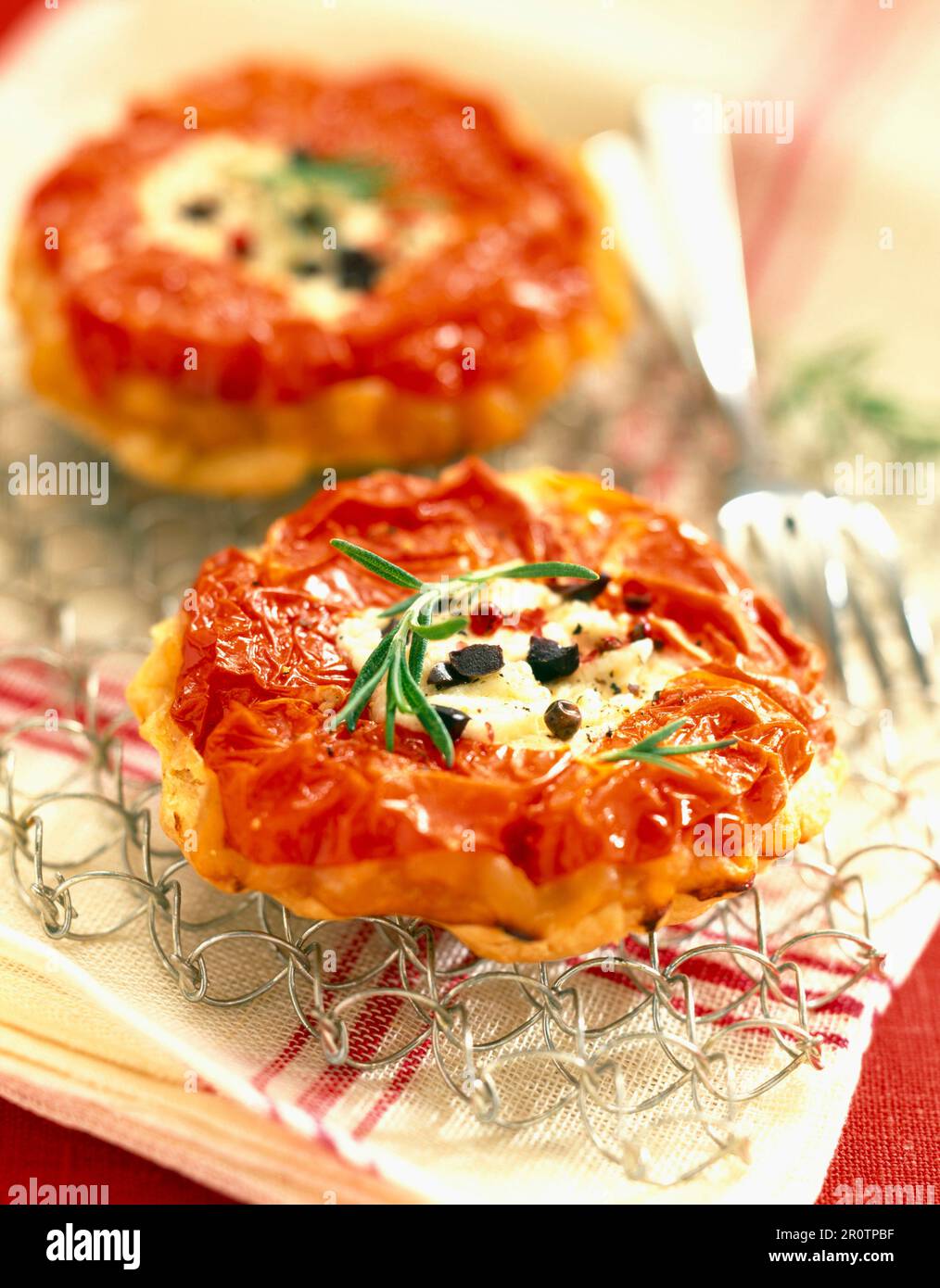 Tomato and goat's cheese tatin tart Stock Photo Alamy