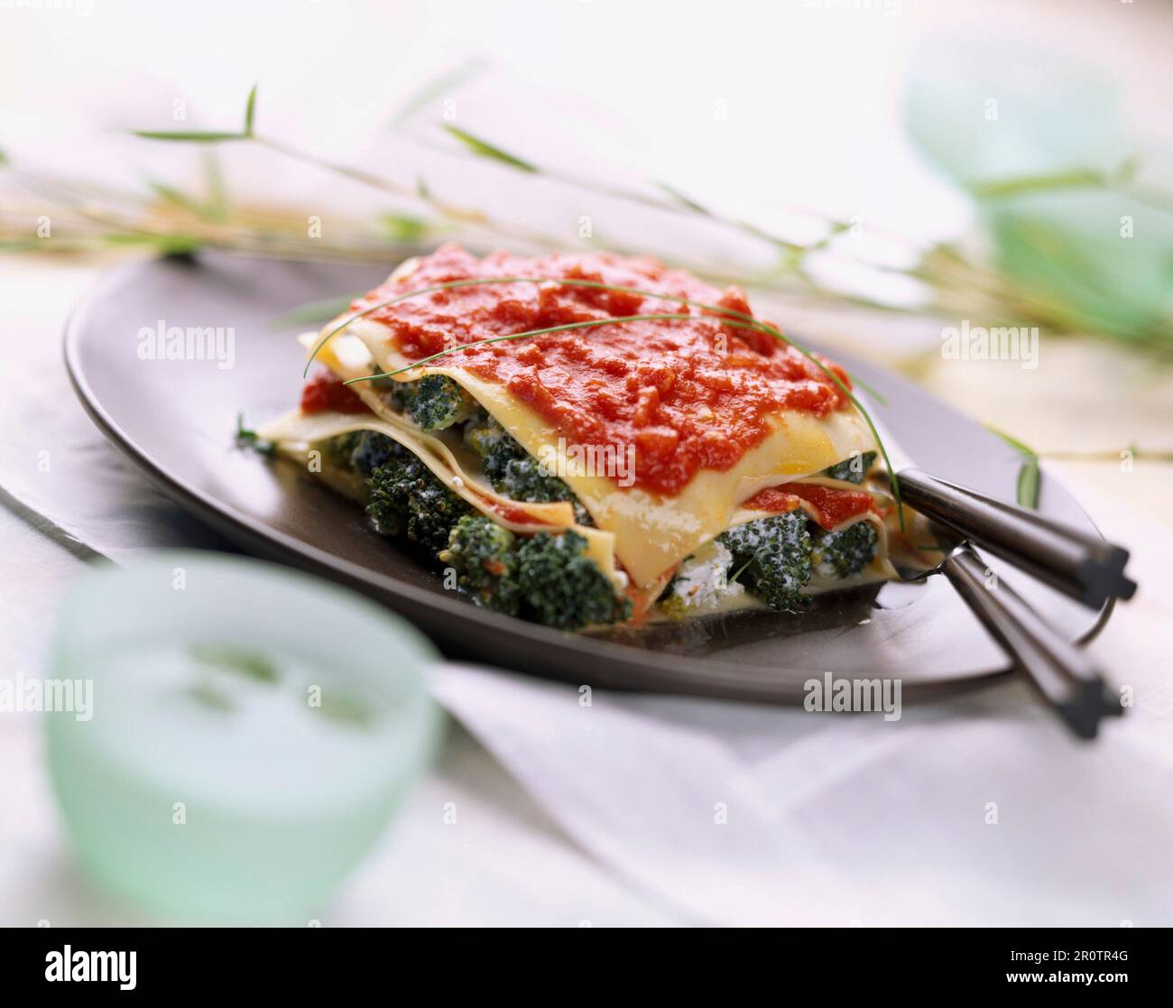 Broccoli and tomato lasagne Stock Photo - Alamy