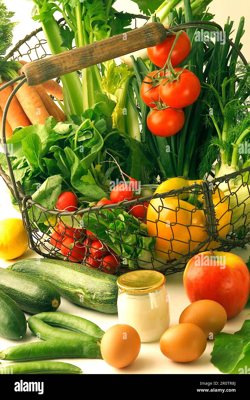 Basket of fresh vegetables and plain yoghurt Stock Photo Alamy