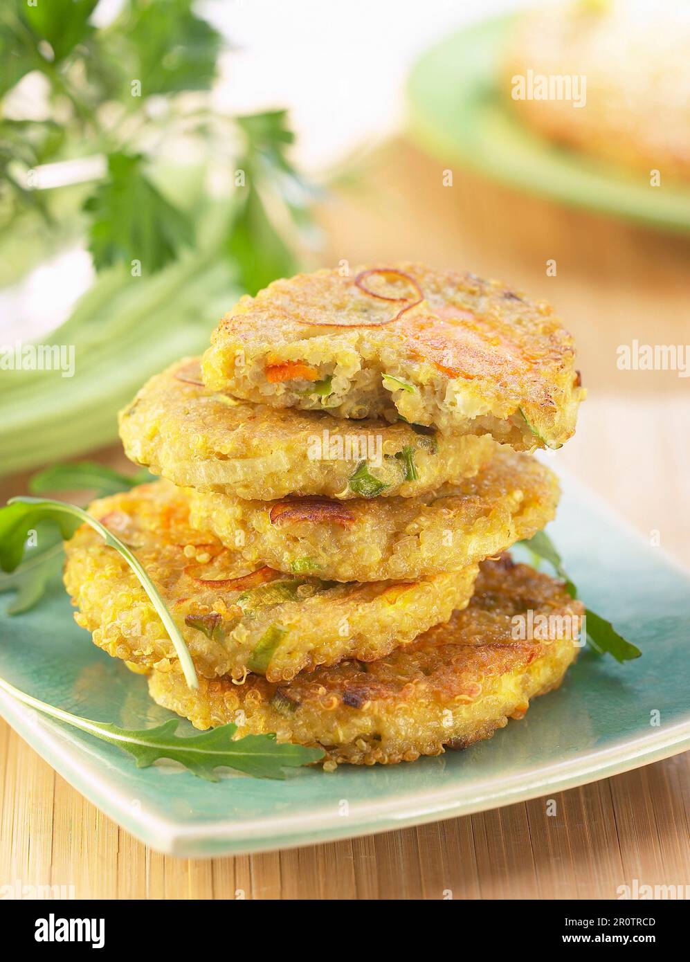 Quinoa fritters with carrots and leek Stock Photo Alamy
