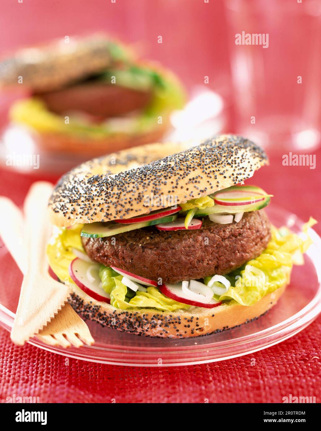 hamburger in poppy seed bagel Stock Photo - Alamy