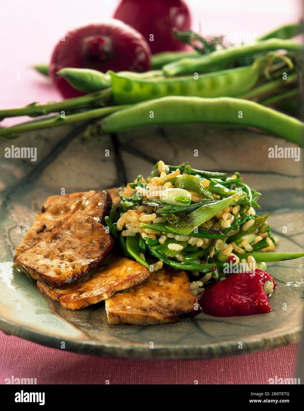 oven marinated tofu with red onion and beet jam Stock Photo Alamy