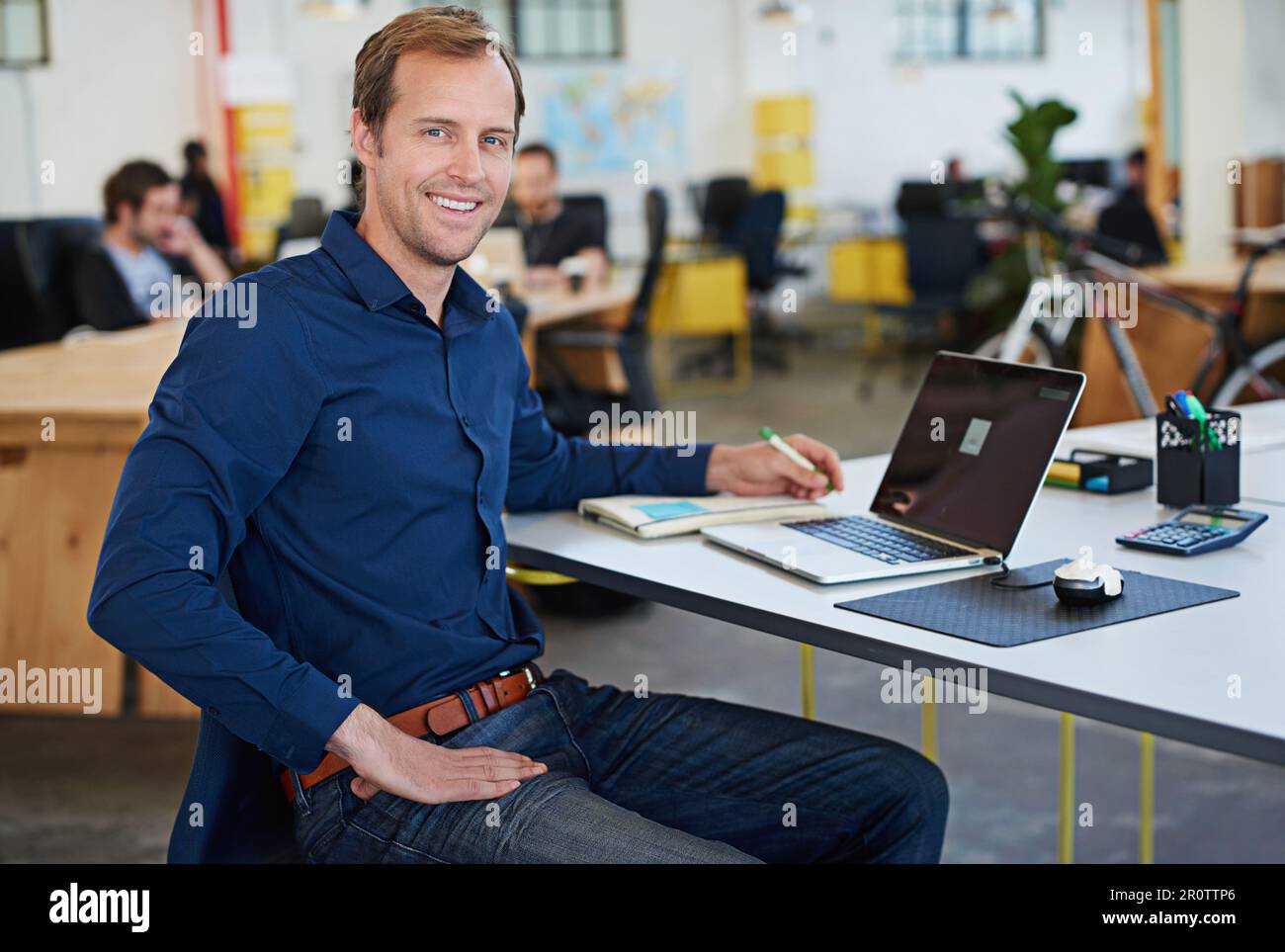 Developing tomorrows tech today. a designer at their workstation in an office. Stock Photo