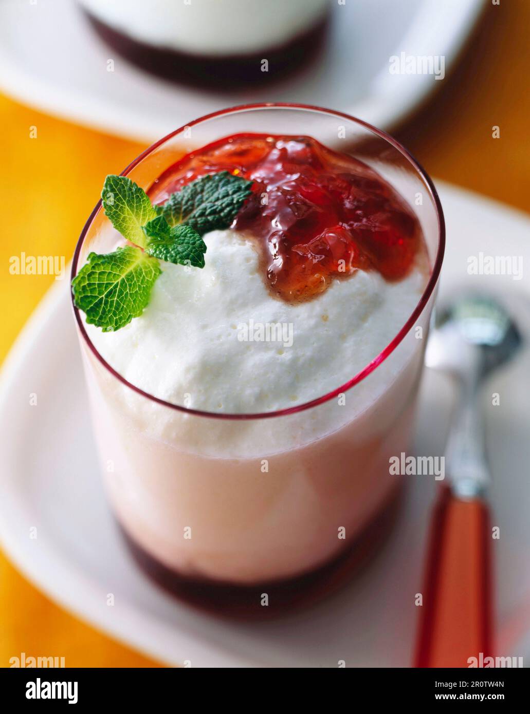 Whipped yoghurt and egg whites with blackcurrant jelly Stock Photo Alamy