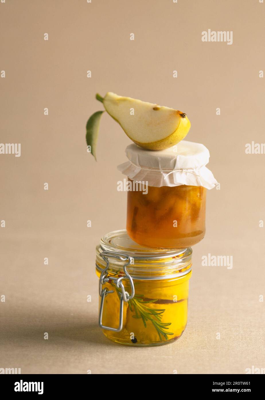 Jar of cheese preserved in oil and pot of jam Stock Photo Alamy