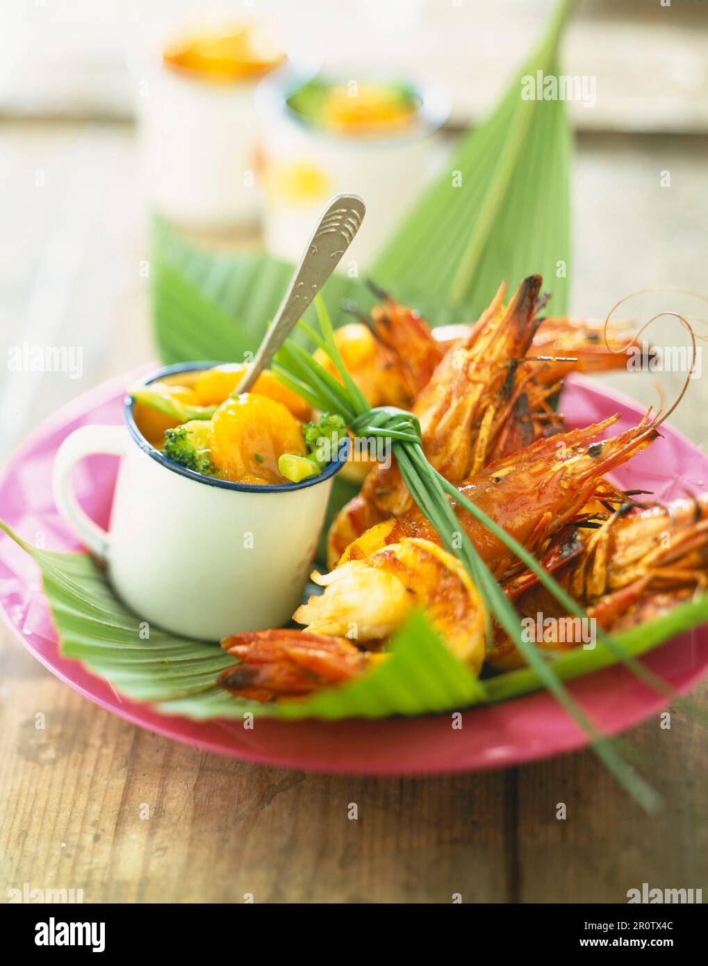 Grilled Mediterranean prawns with broccoli and apricots Stock Photo