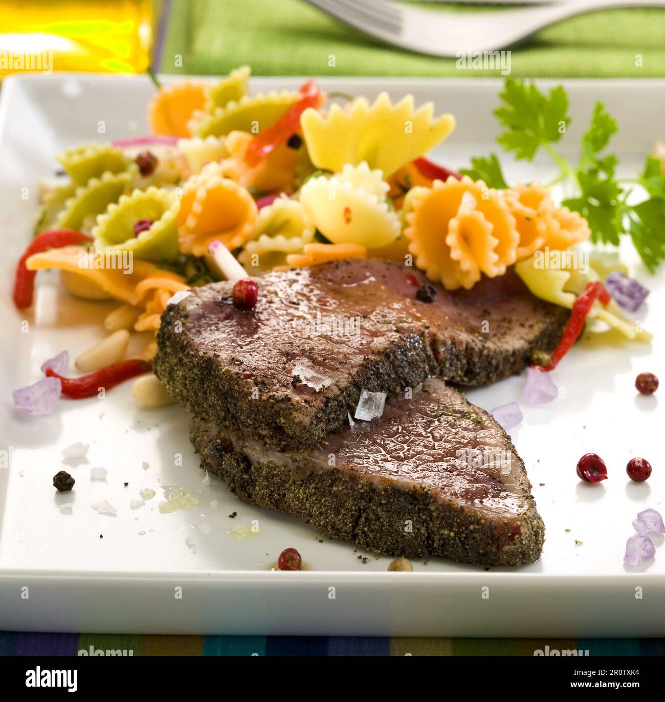 roast beef in herb crust with cappellettis Stock Photo Alamy