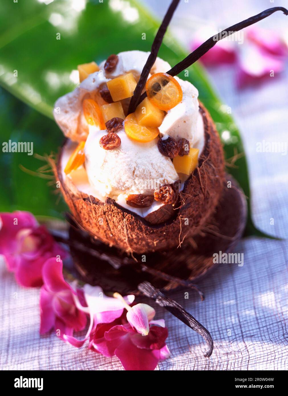 Coconut ice cream with exotic fruit Stock Photo Alamy