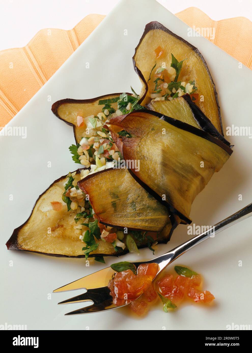 Eggplant slices fried with Lebanese tabbouleh Stock Photo Alamy