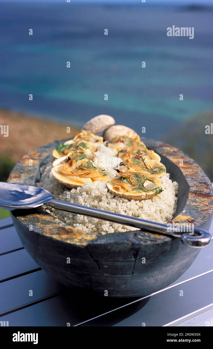 Ovenbaked clams with almonds Stock Photo Alamy