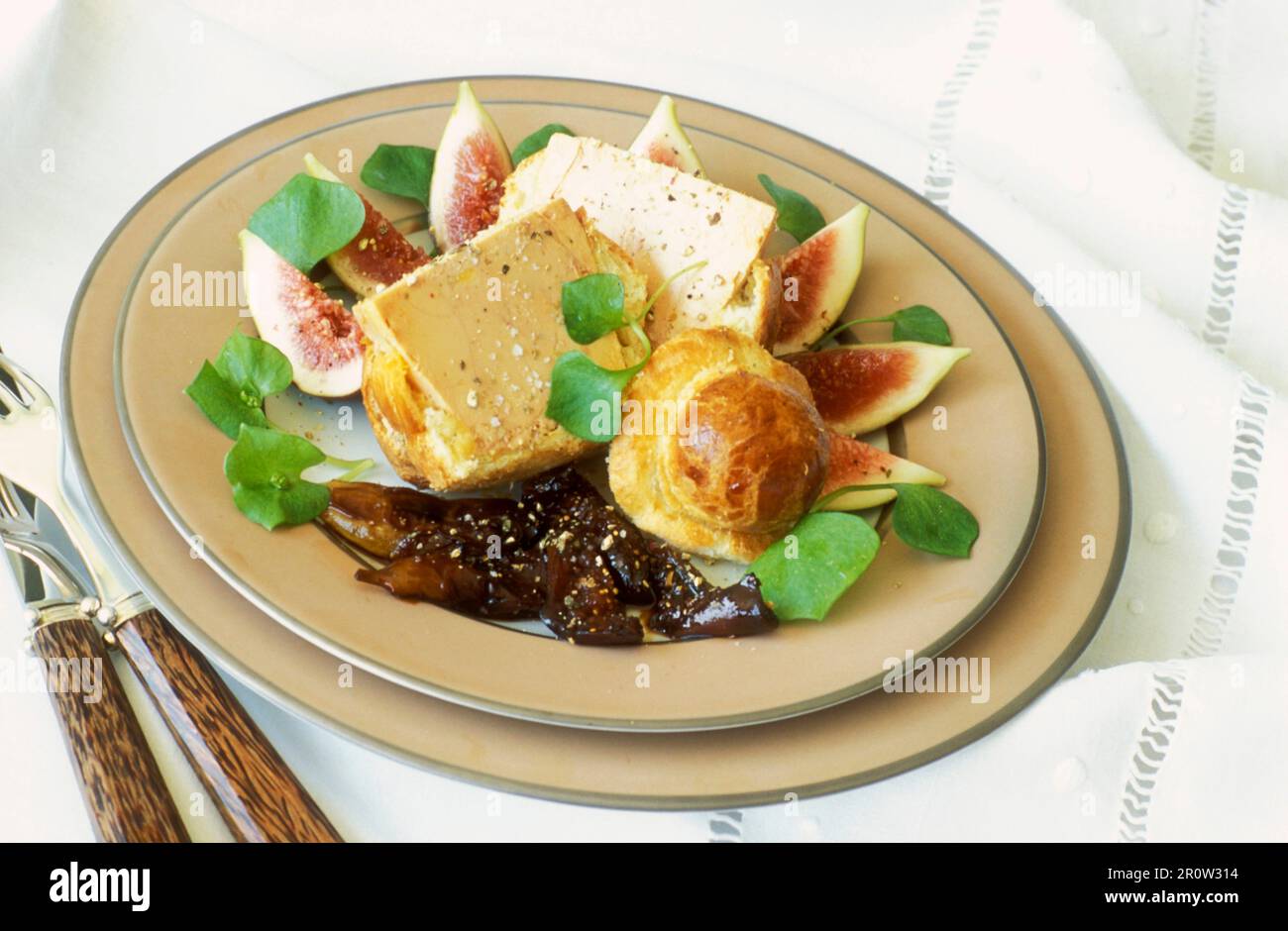 Foie gras, brioche and fig chutney with port wine Stock Photo