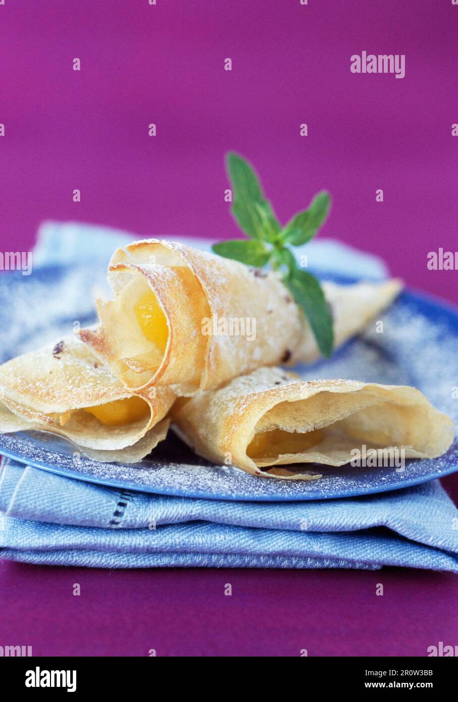 Stewed apples in crunchy cone Stock Photo Alamy