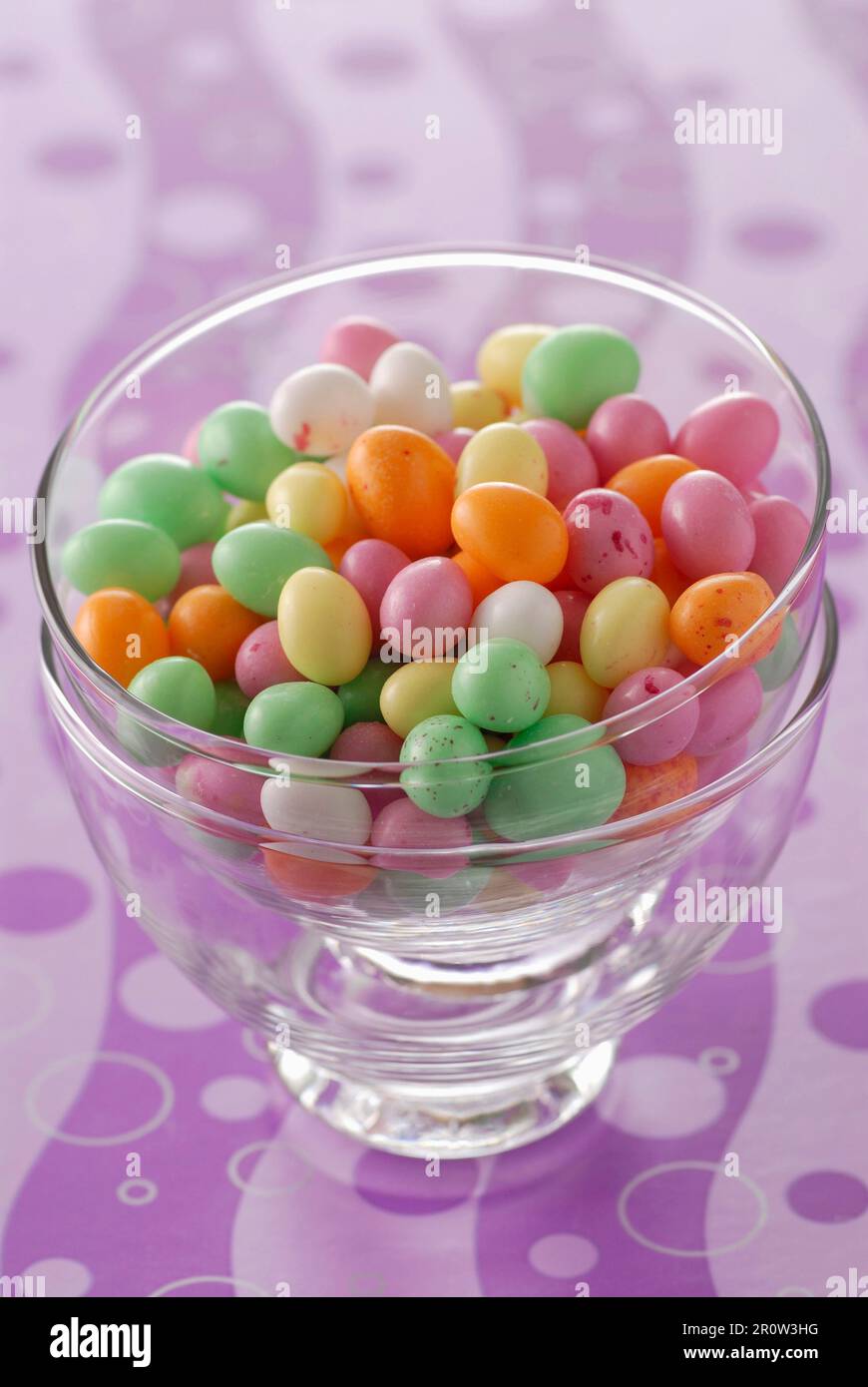 Glass bowl of small easter eggs Stock Photo