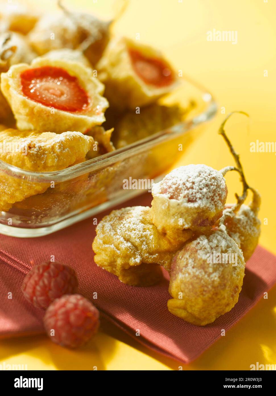 Small strawberry fritters Stock Photo - Alamy