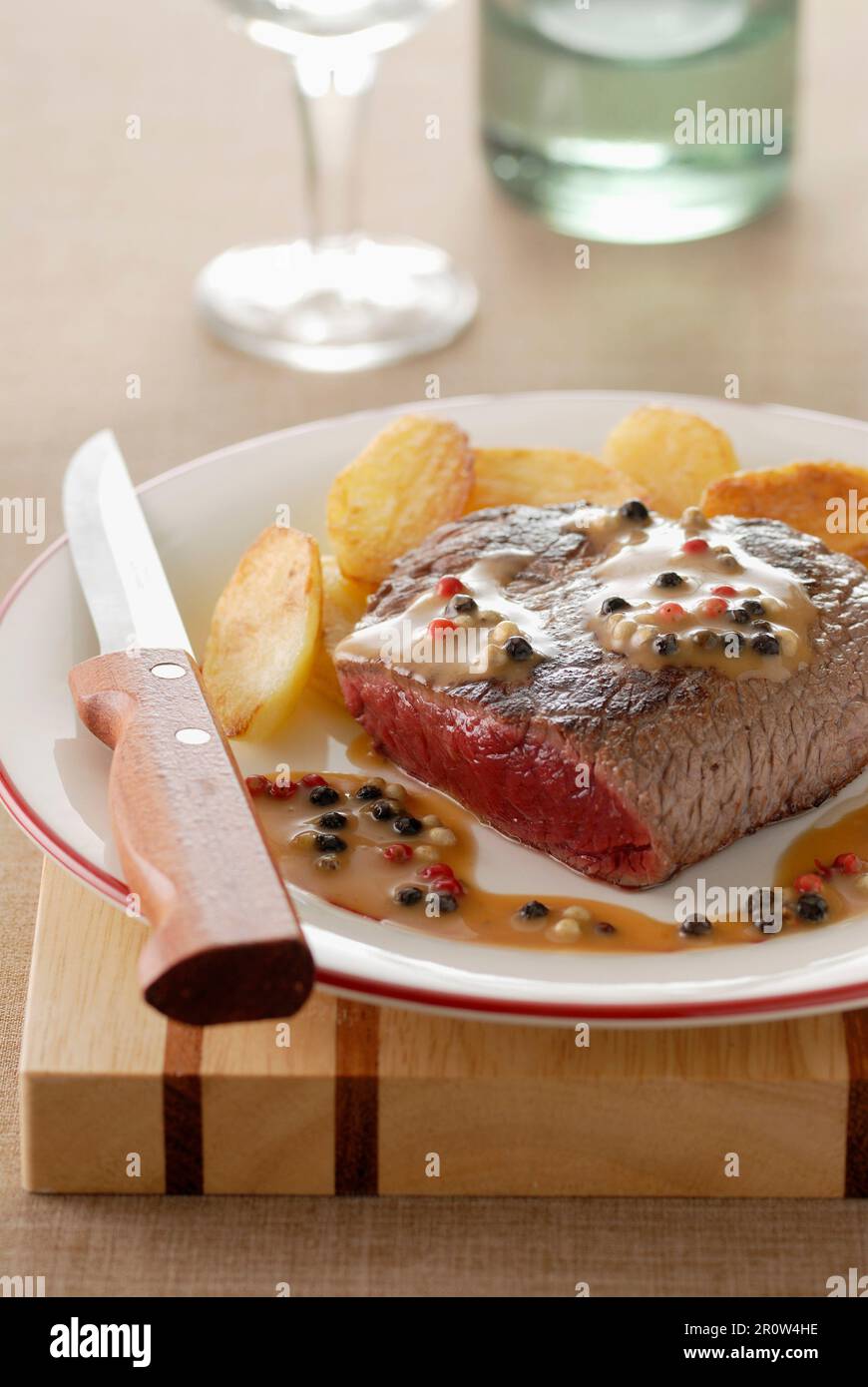 Thick beef steak with pepper sauce Stock Photo