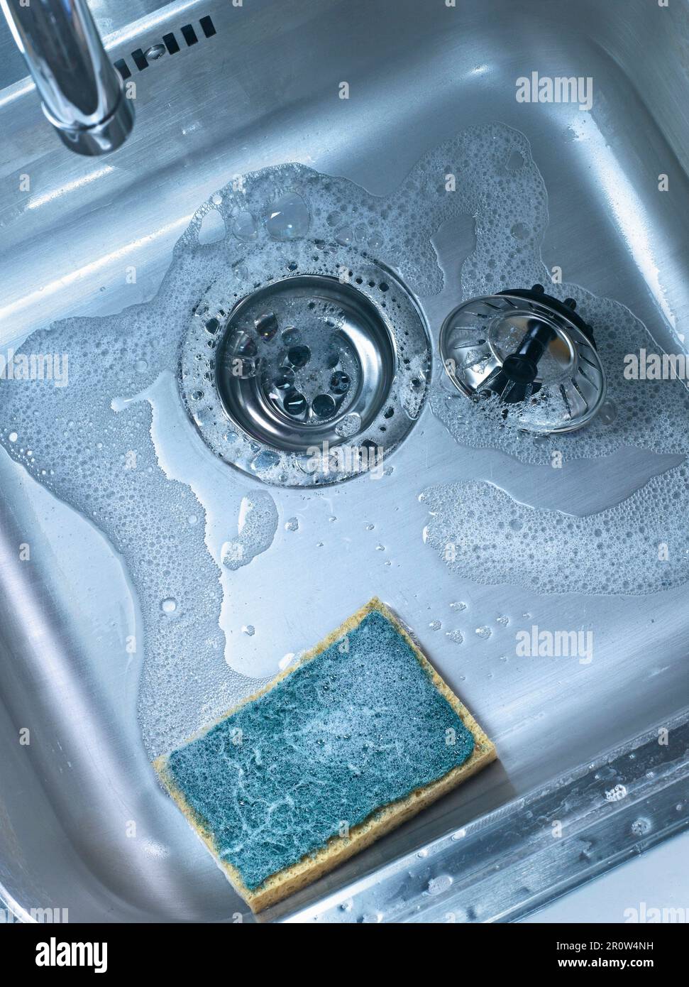 Sponge in the sink Stock Photo