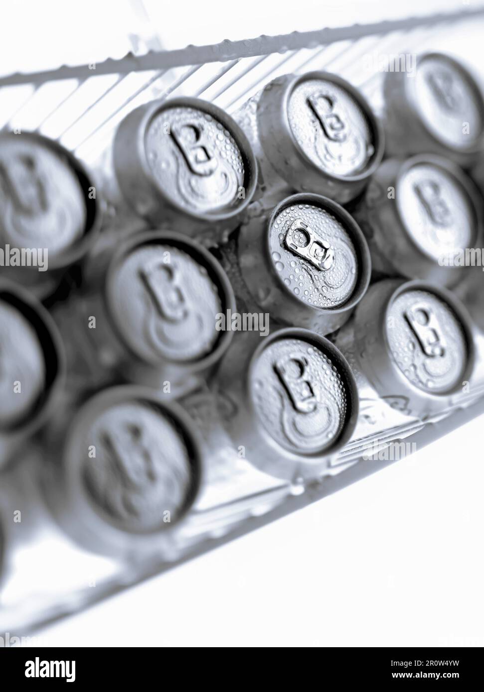 Layers of cans in the refrigerator Stock Photo Alamy