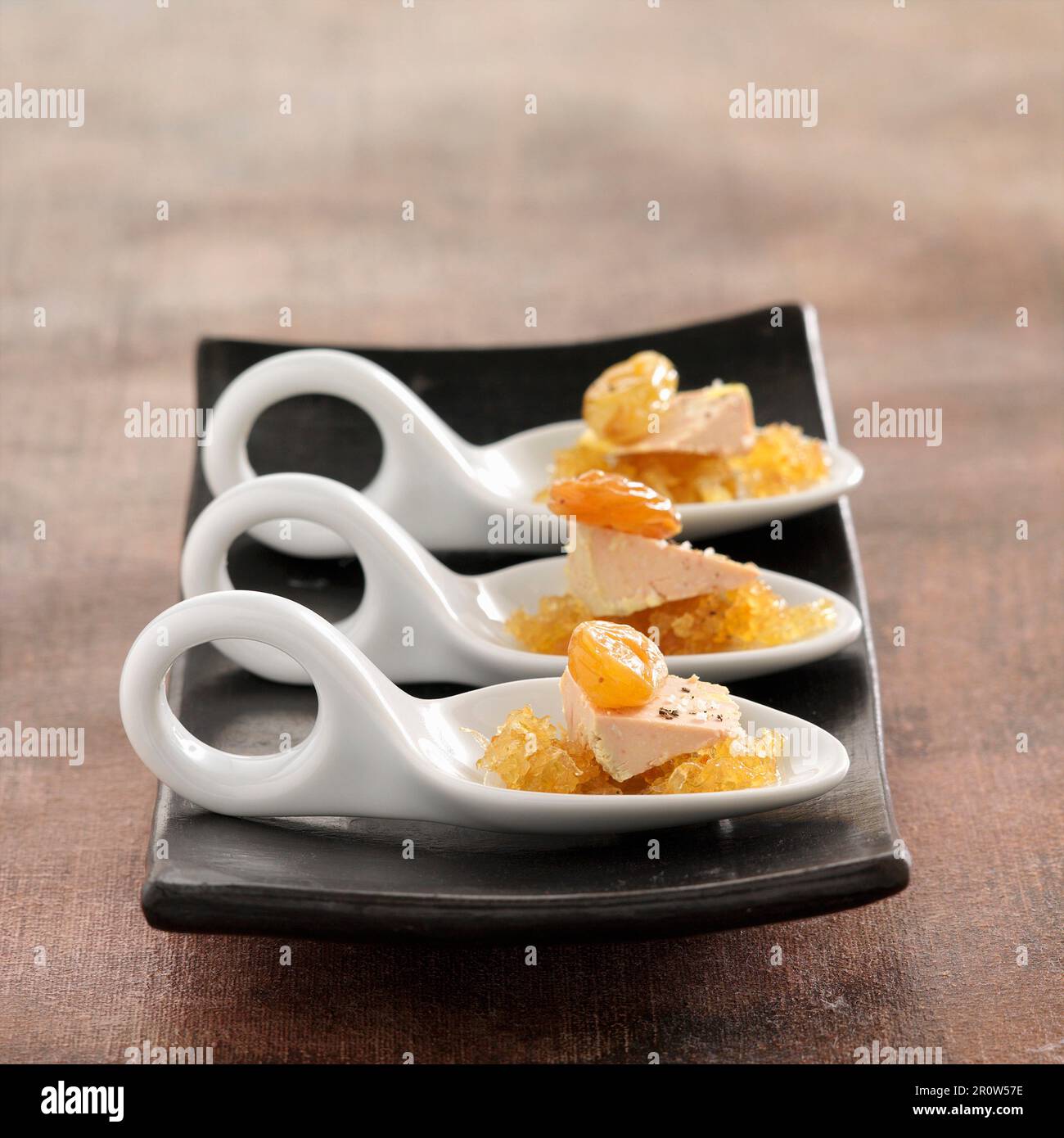 Spoonsful of Foie gras with onion jam and raisins Stock Photo Alamy