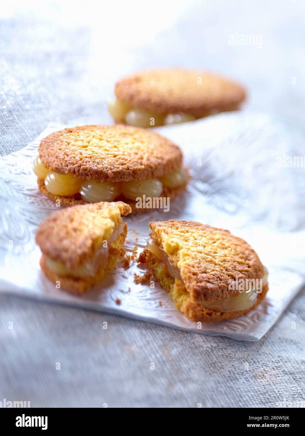 Shortbread cookies filled with lemon curd Stock Photo Alamy
