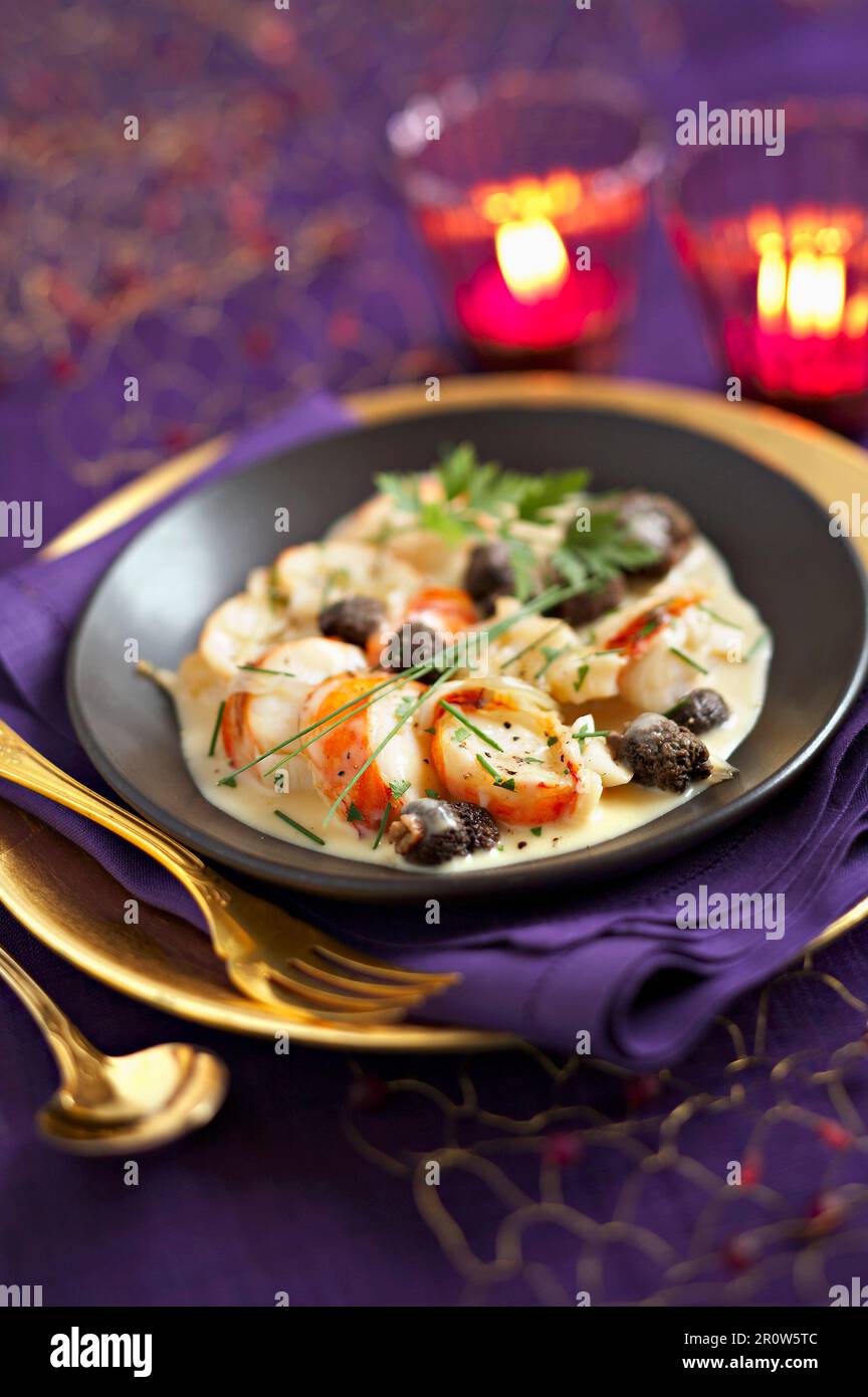 Spiny lobster sauteed with Arbois wine Stock Photo