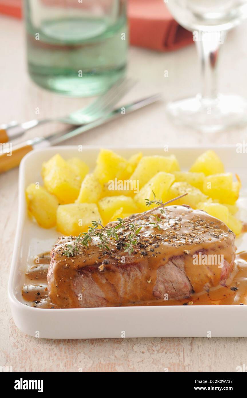 Steak with pepper sauce Stock Photo