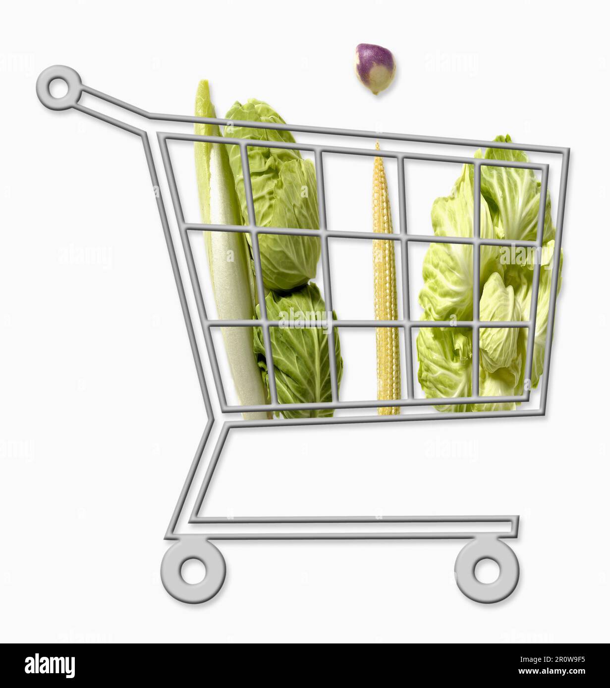 Mini supermarket trolley full of organic vegetables Stock Photo