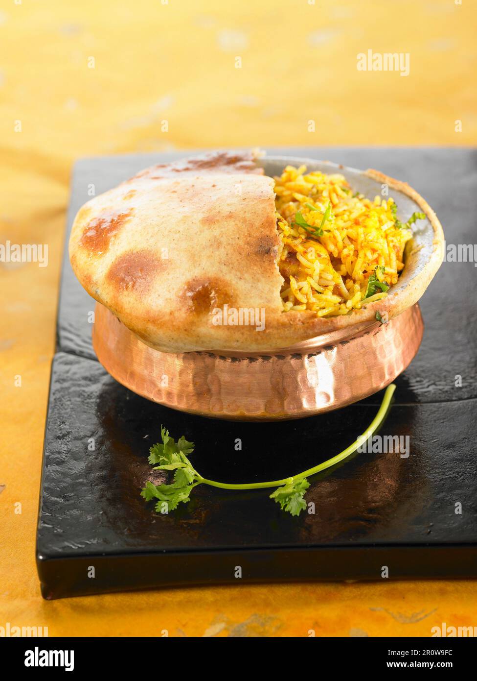 Biryani chicken with cardamomflavored Basmati rice Stock Photo Alamy