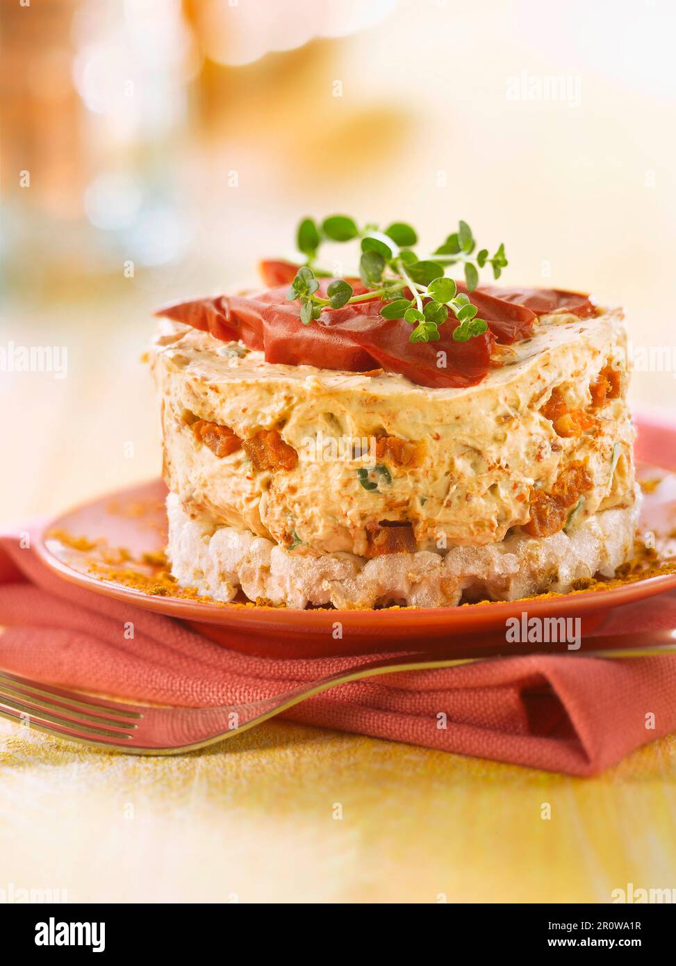 Chorizo,piquillo peppers,rice cake and chili pepper cheesecake Stock