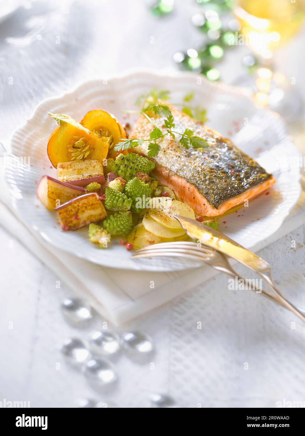 Thick piece of salmon with old-fashioned vegetables Stock Photo