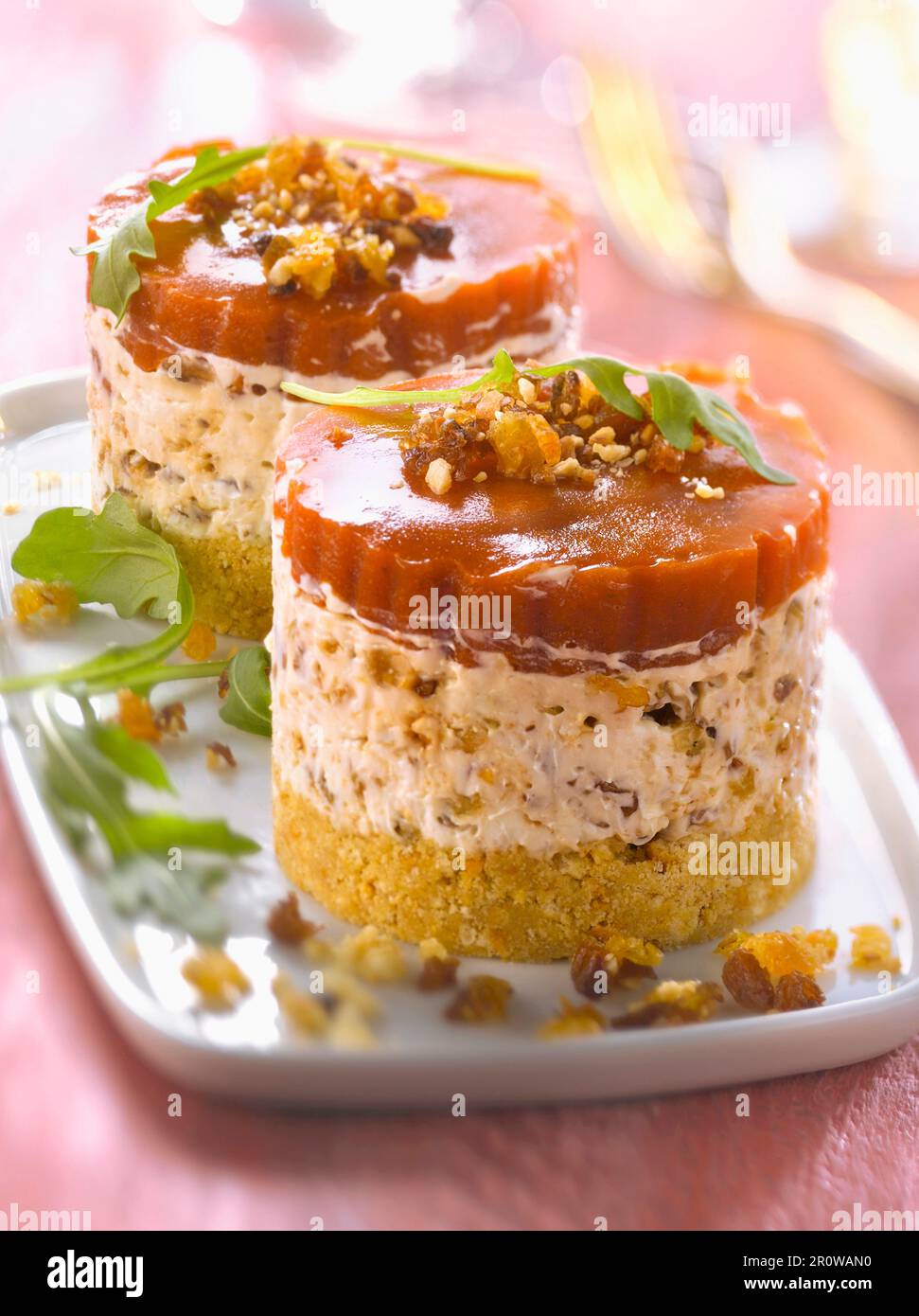 Goat's cheese, dried fruit and tomato aspic mini cheesecakes Stock